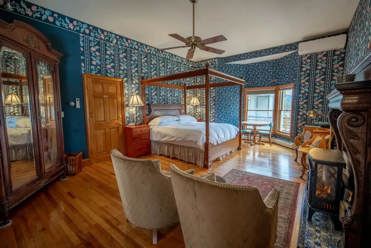 Split image showing a wooden porch with chairs and a bathroom vanity with towels.