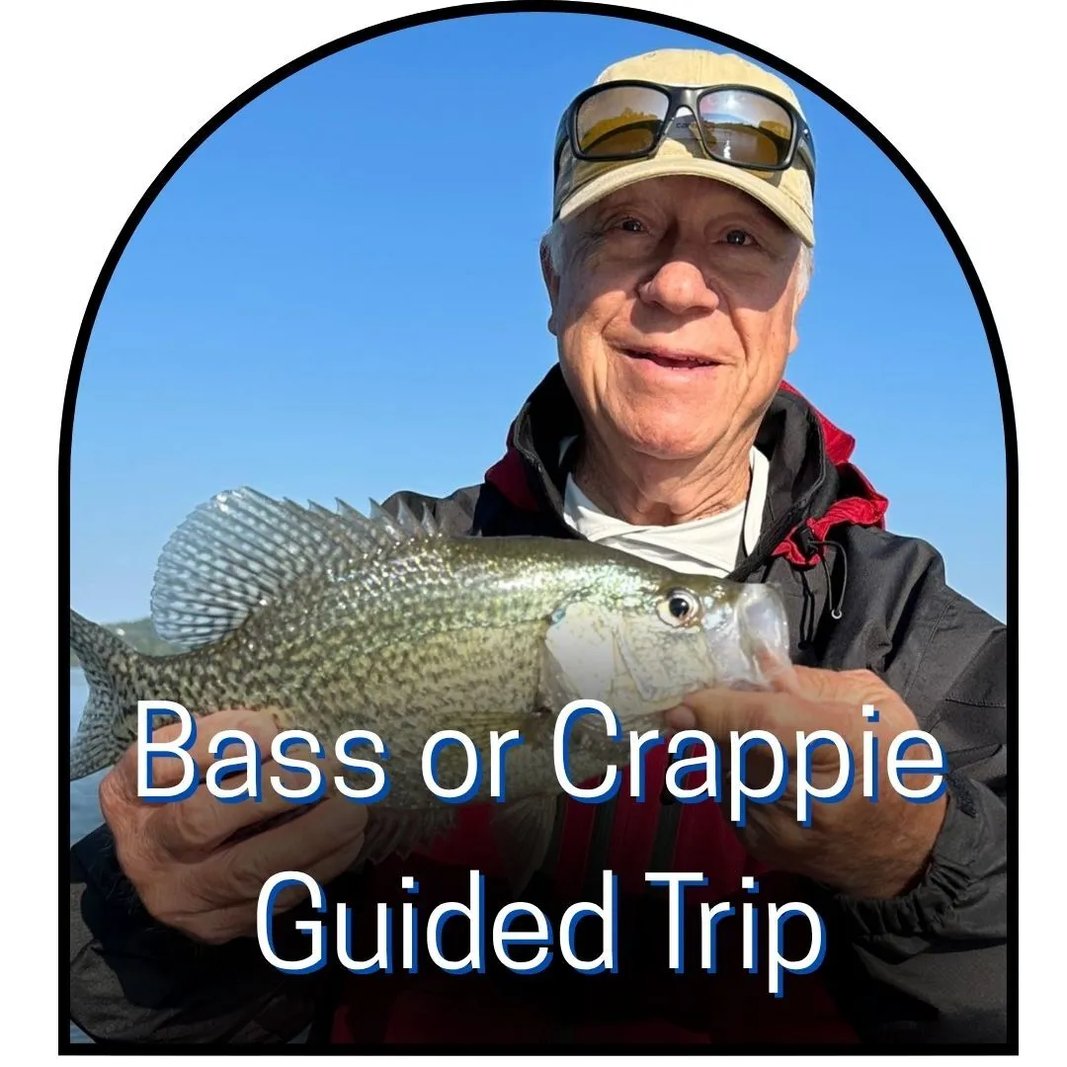 Man in sunglasses holding a large crappie with text overlay 'Bass or Crappie Guided Trip'.