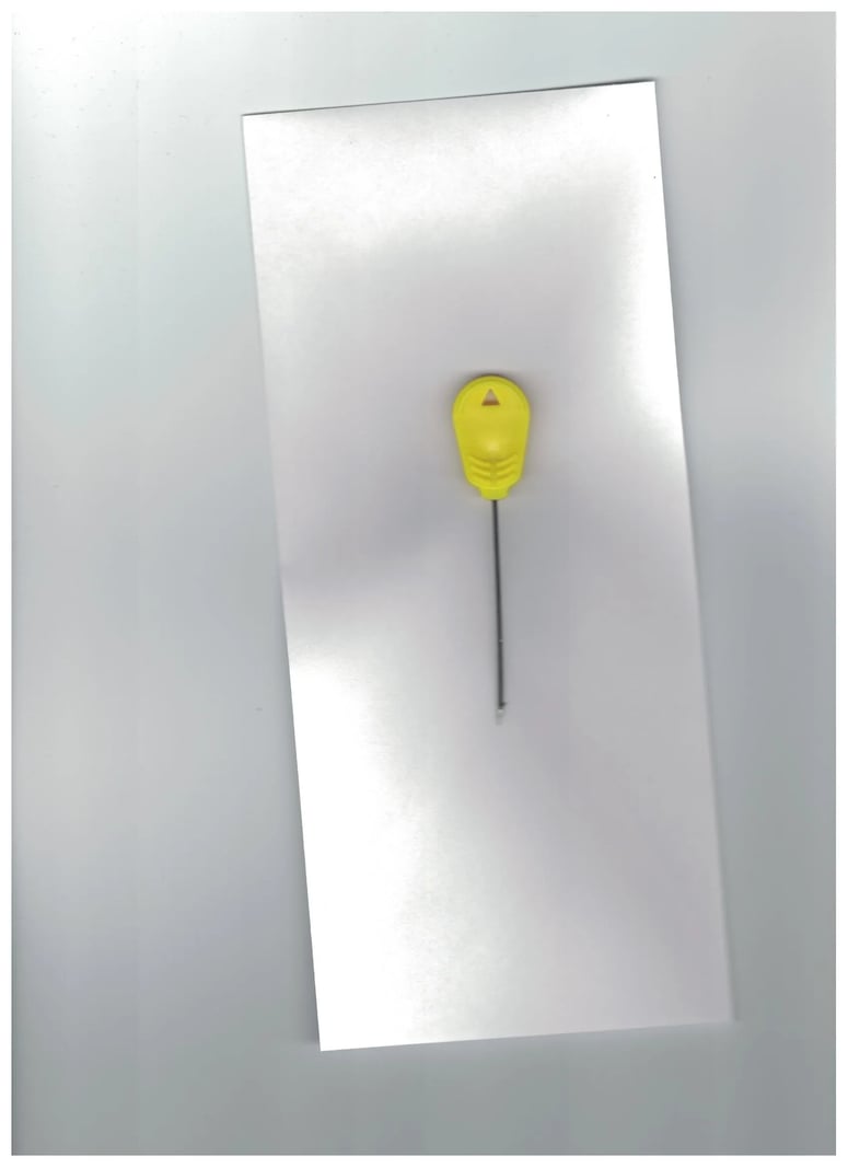 Baiting needle with a yellow handle on a white background.