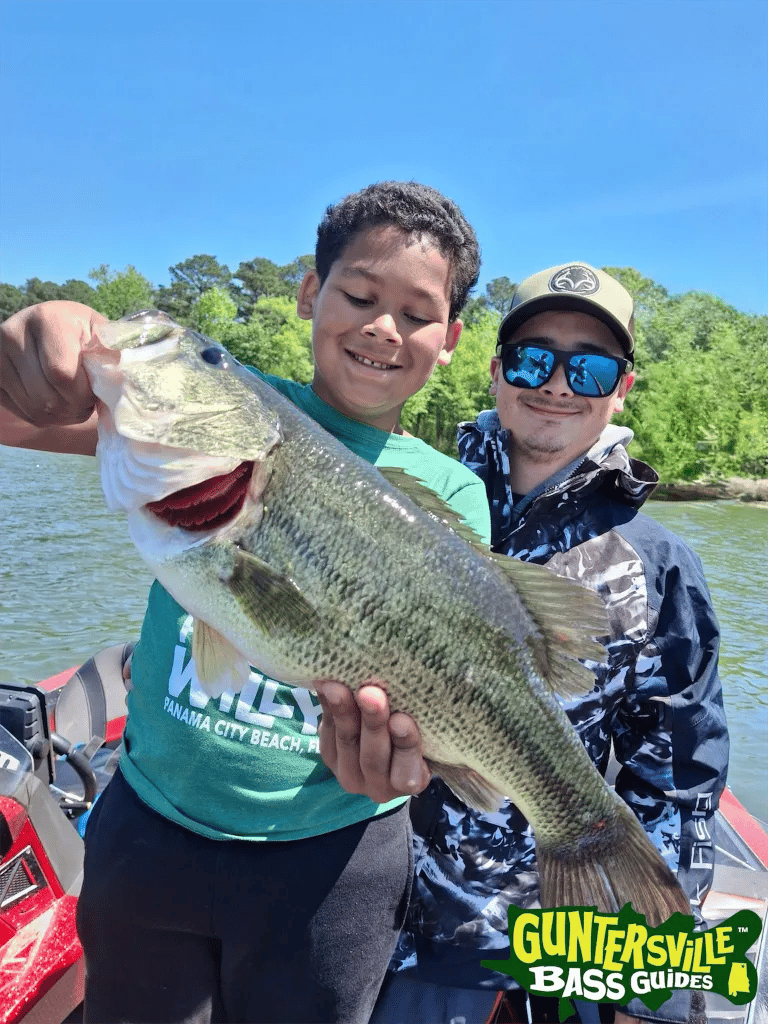 Capt. Phillip Criss client with a big bass on Lake Guntersville