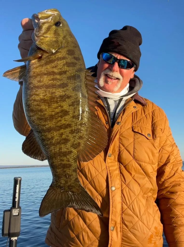Captain Mick with a trophy Lake Champlain smallmouth bass