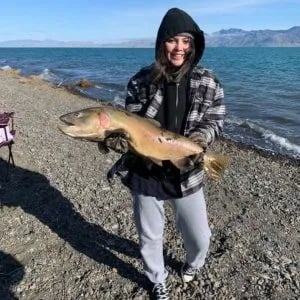 Girl With cutthroat trout