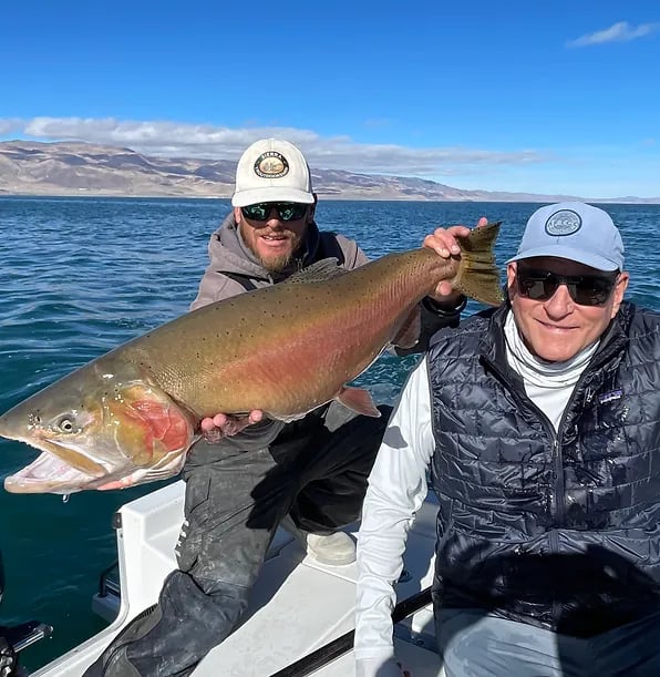 Client and guide holding a 25 pound Cutthroat trout