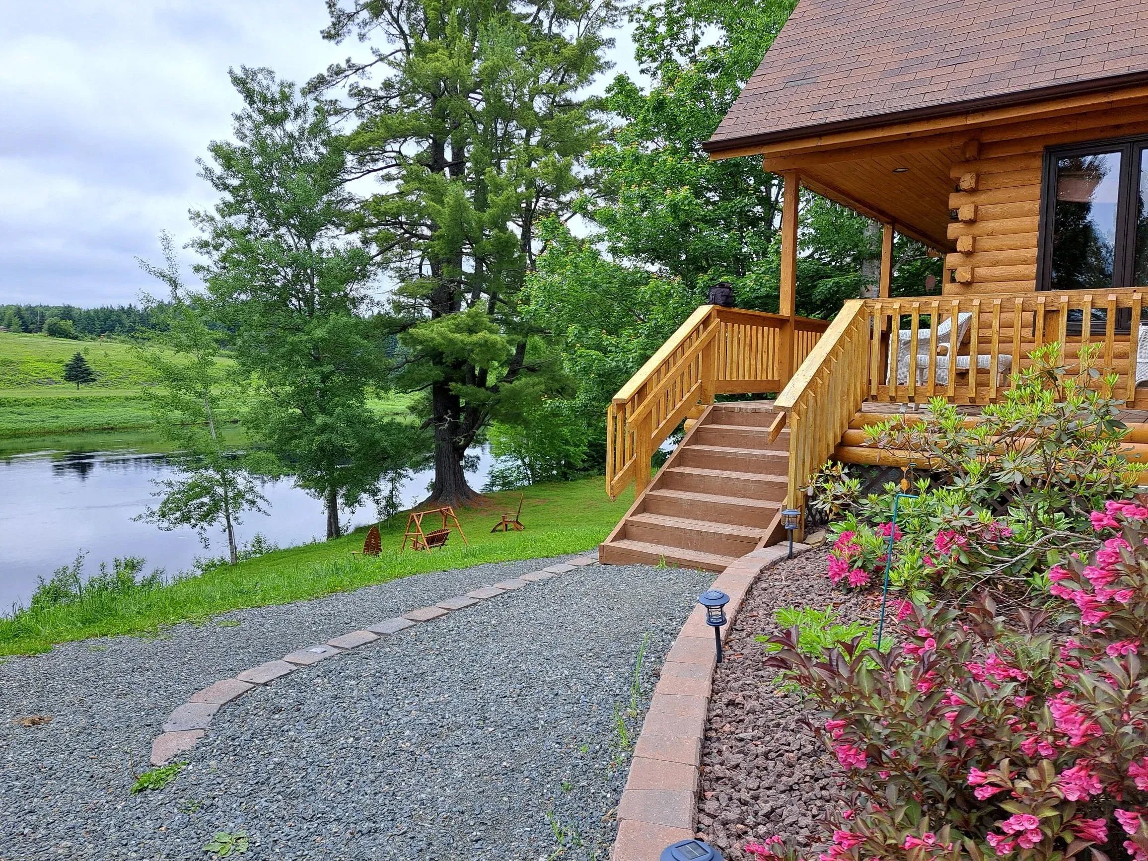 Entrance area to the kitchen area for the all inclusive guests with Miramichi River in the background.