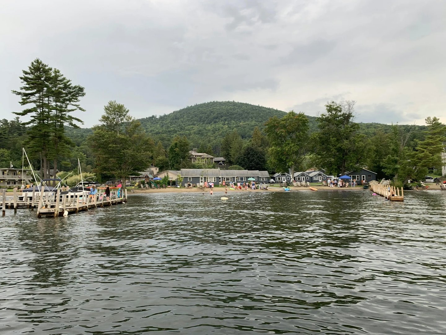 Panoramic view of Blue Lagoon Resort buildings along the lakefront under a blue sky