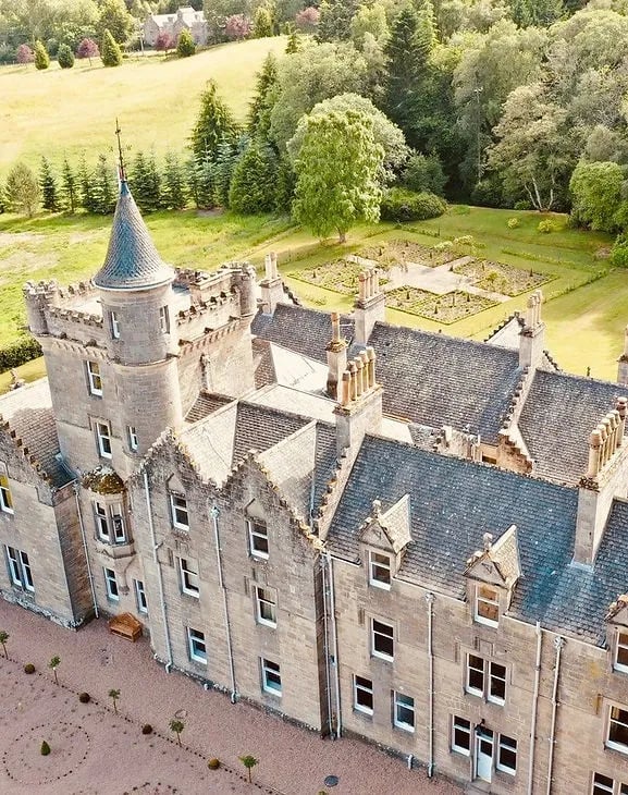 Aerial view of the historic Rothes Glen castle and its surrounding green estate.