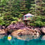 Kayaker in front of yurt at Orca Island Cabins