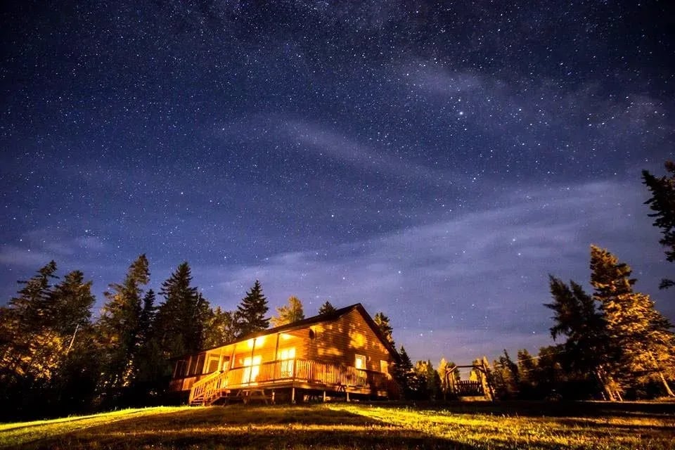 Private cottage to accomodate guests of Country Haven with clear night slies and stars shing over the Miramichi River in New Brunswick.